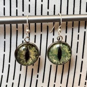 Green Mythical Creature Cat Eye Design Silver Earrings